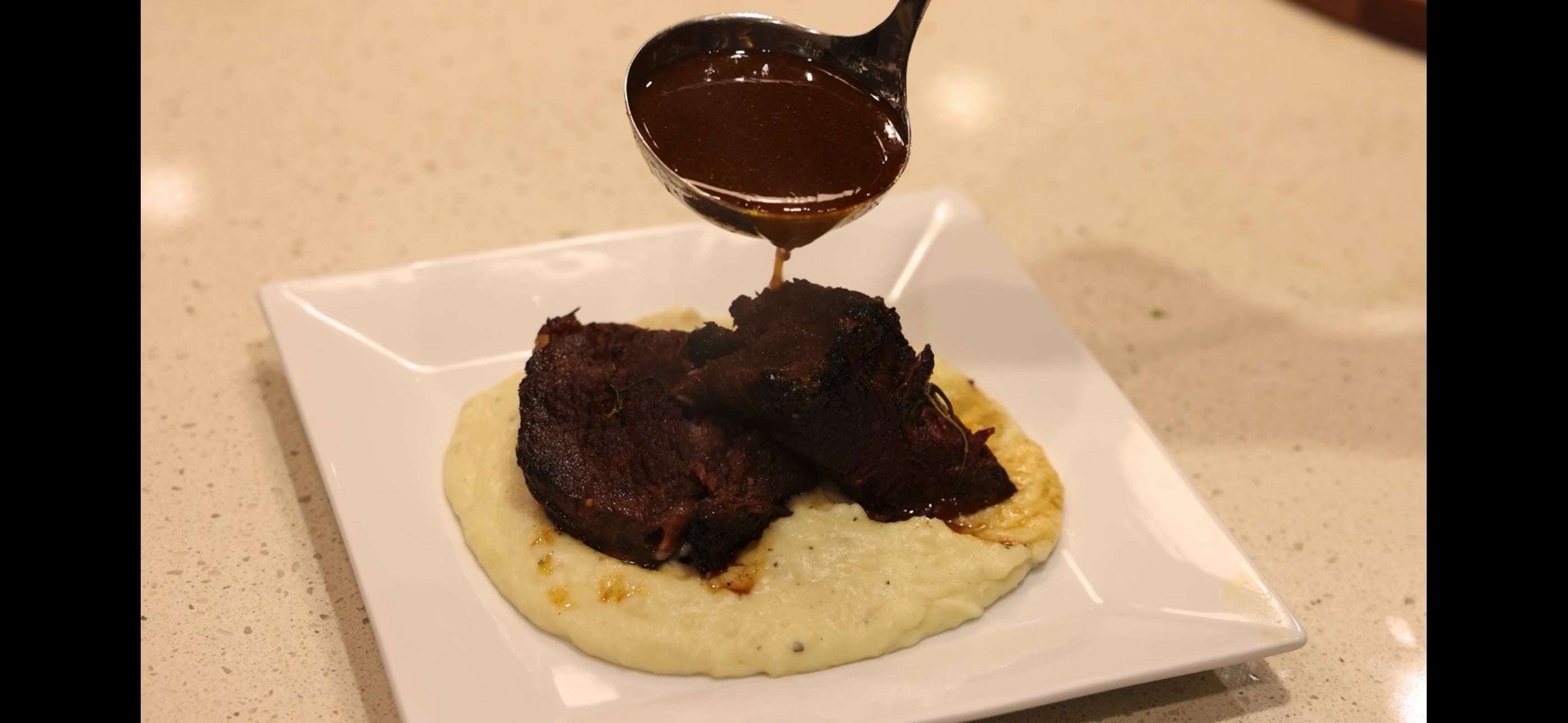 Load video: Smoked and Slow cooked Beef Rib &amp; Garlic Mash